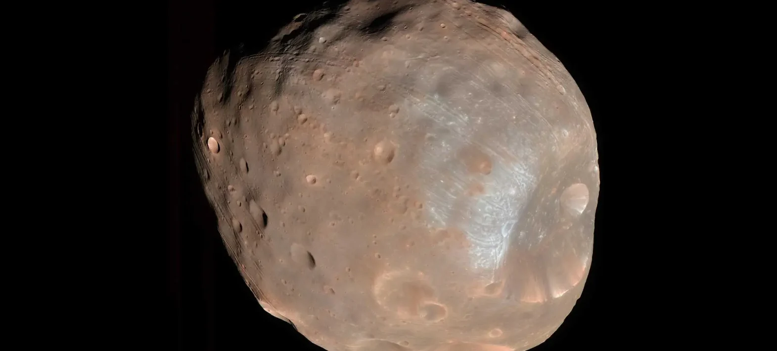 Comprendre les mouvements du régolithe à la surface de Phobos pour préparer la mission MMX