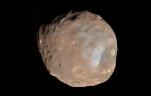 Comprendre les mouvements du régolithe à la surface de Phobos pour préparer la mission MMX